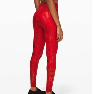 Lululemon Wunder Under High-Rise Leggings, Red Embossed Manifesto print, size 4